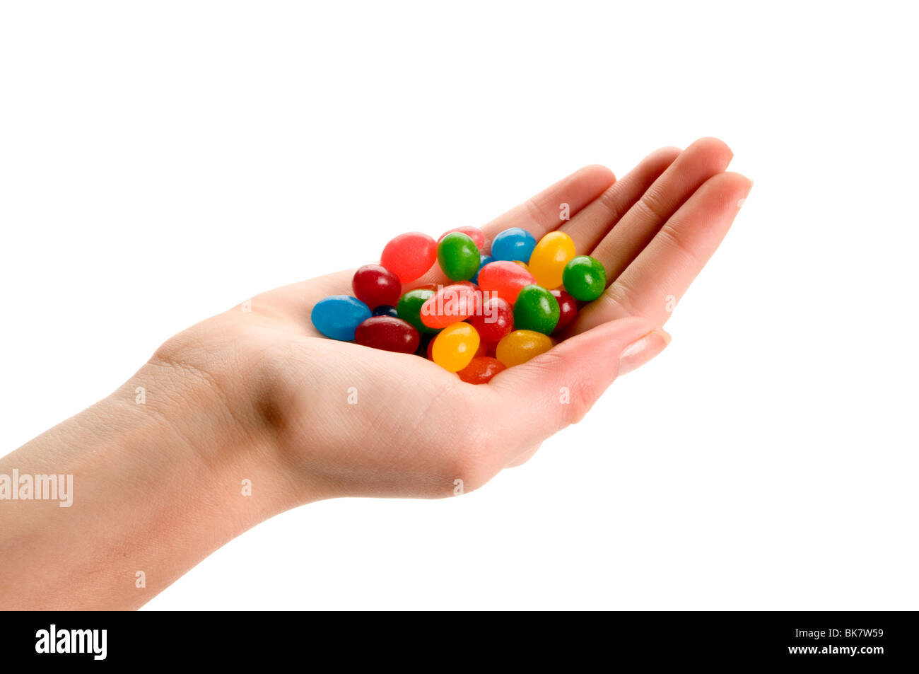 hand holding jelly beans Stock Photo