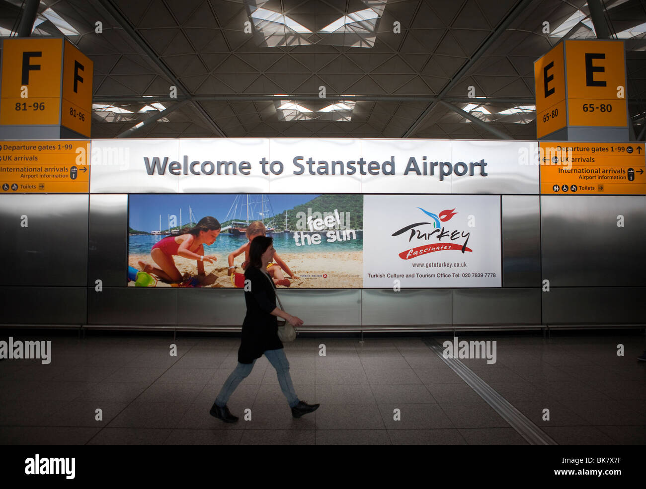 Welcome to Stansted Airport sign inside the terminal of London Stansted airport in Essex Stock Photo