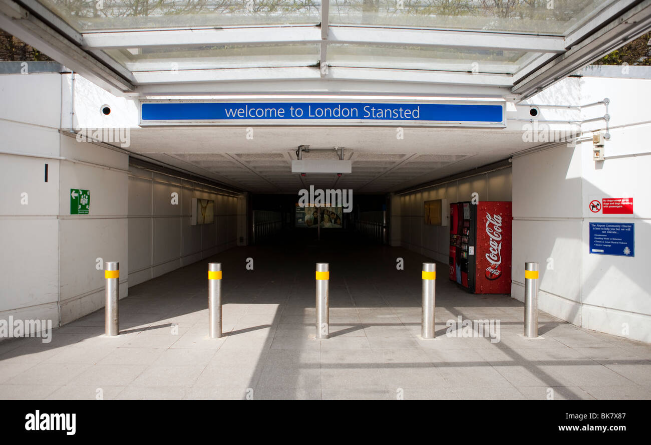 Welcome to London Stansted sign at the entrance to the terminal of London Stansted airport in Essex, UK from the bus terminal Stock Photo