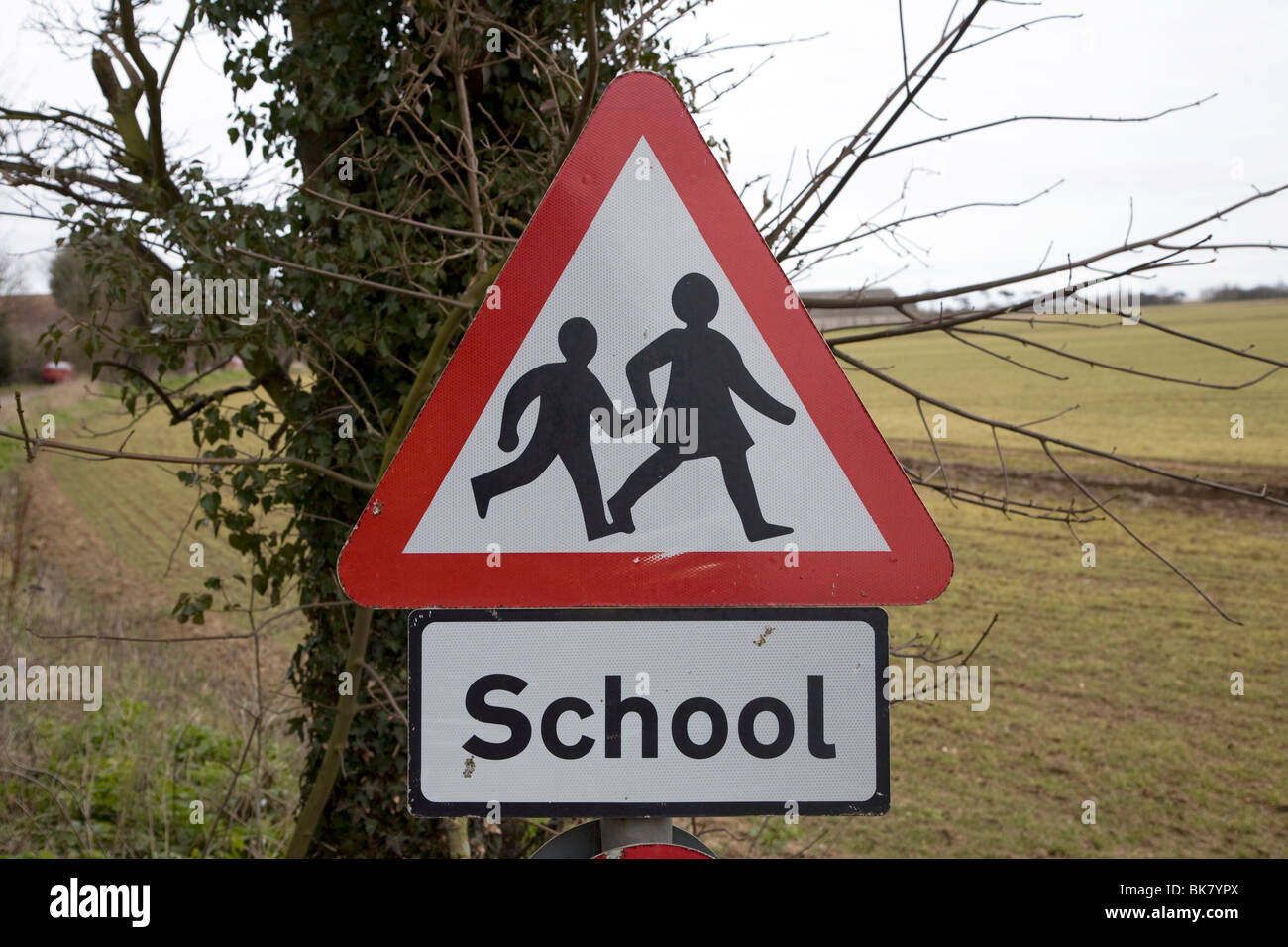 Red triangular school road sign Stock Photo