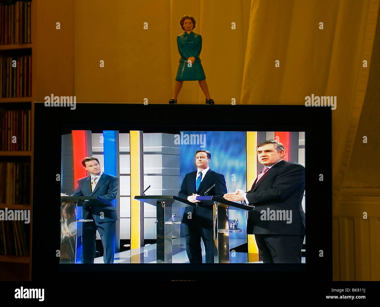 The first three leaders election debate watched over by a 'Nut cracker' - Margaret Thatcher' in the photographers living room. Stock Photo