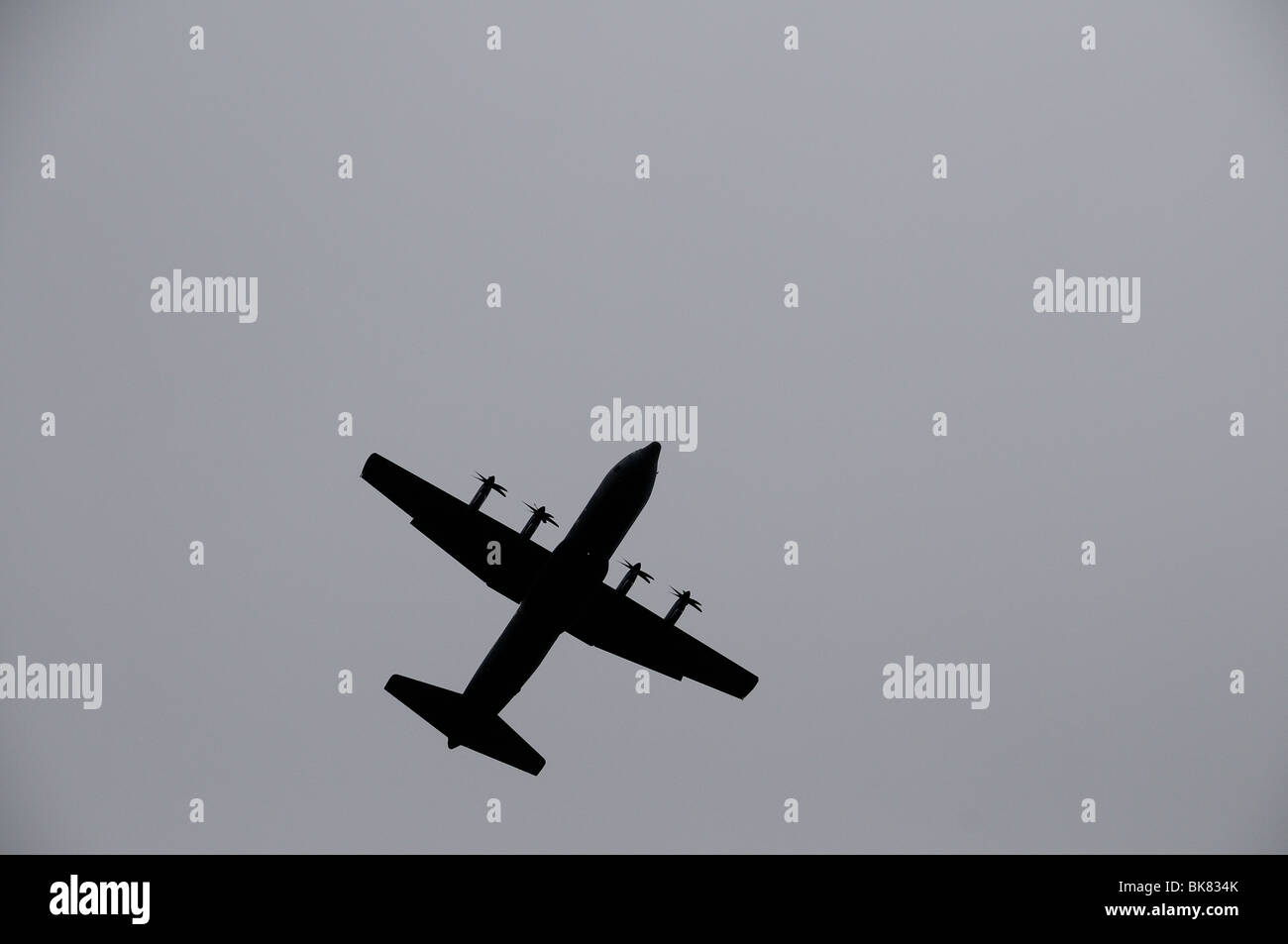 Veteran aircraft flying on a gray day. Stock Photo