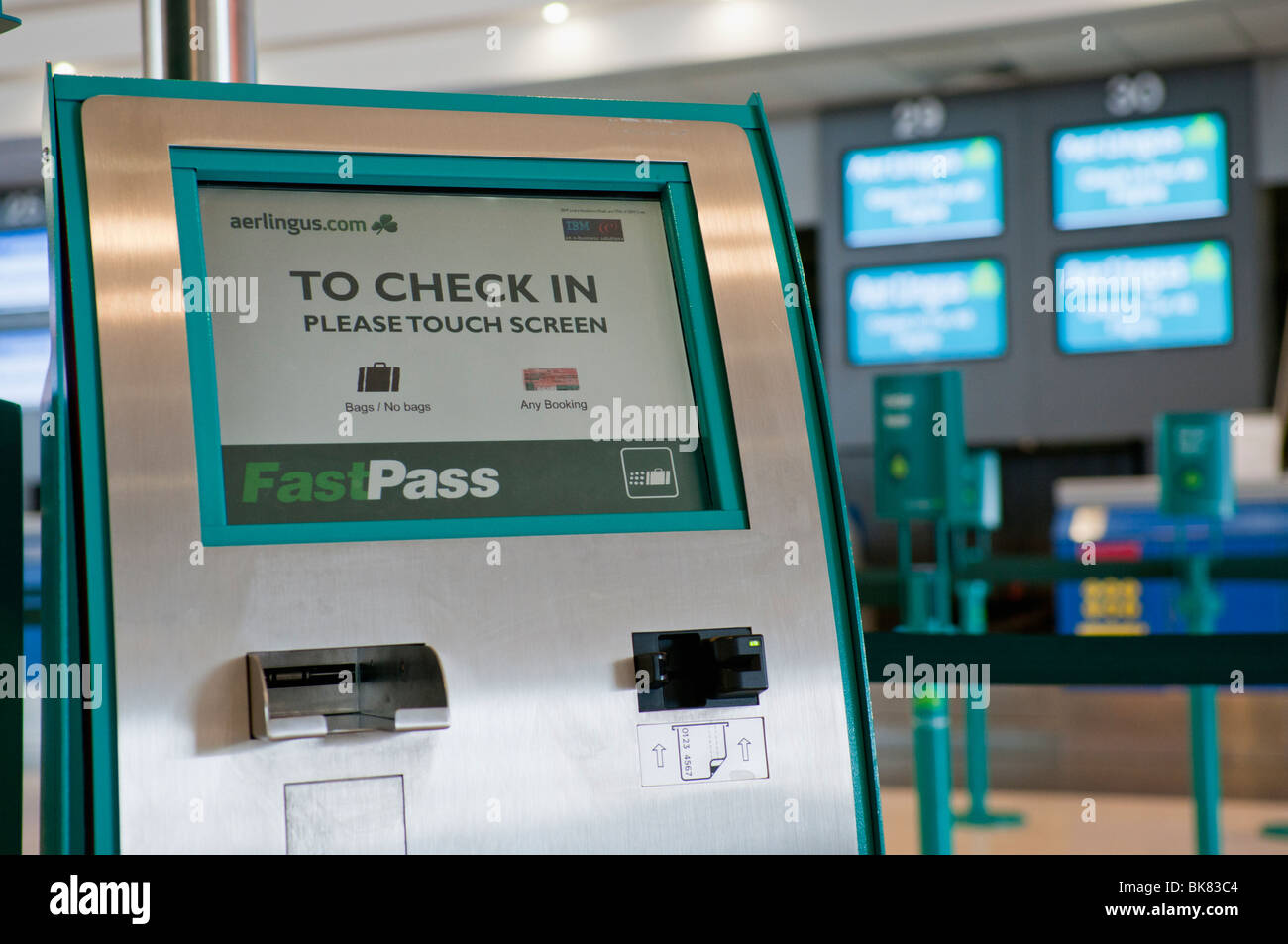 Aer Lingus self check-in terminal at an airport Stock Photo