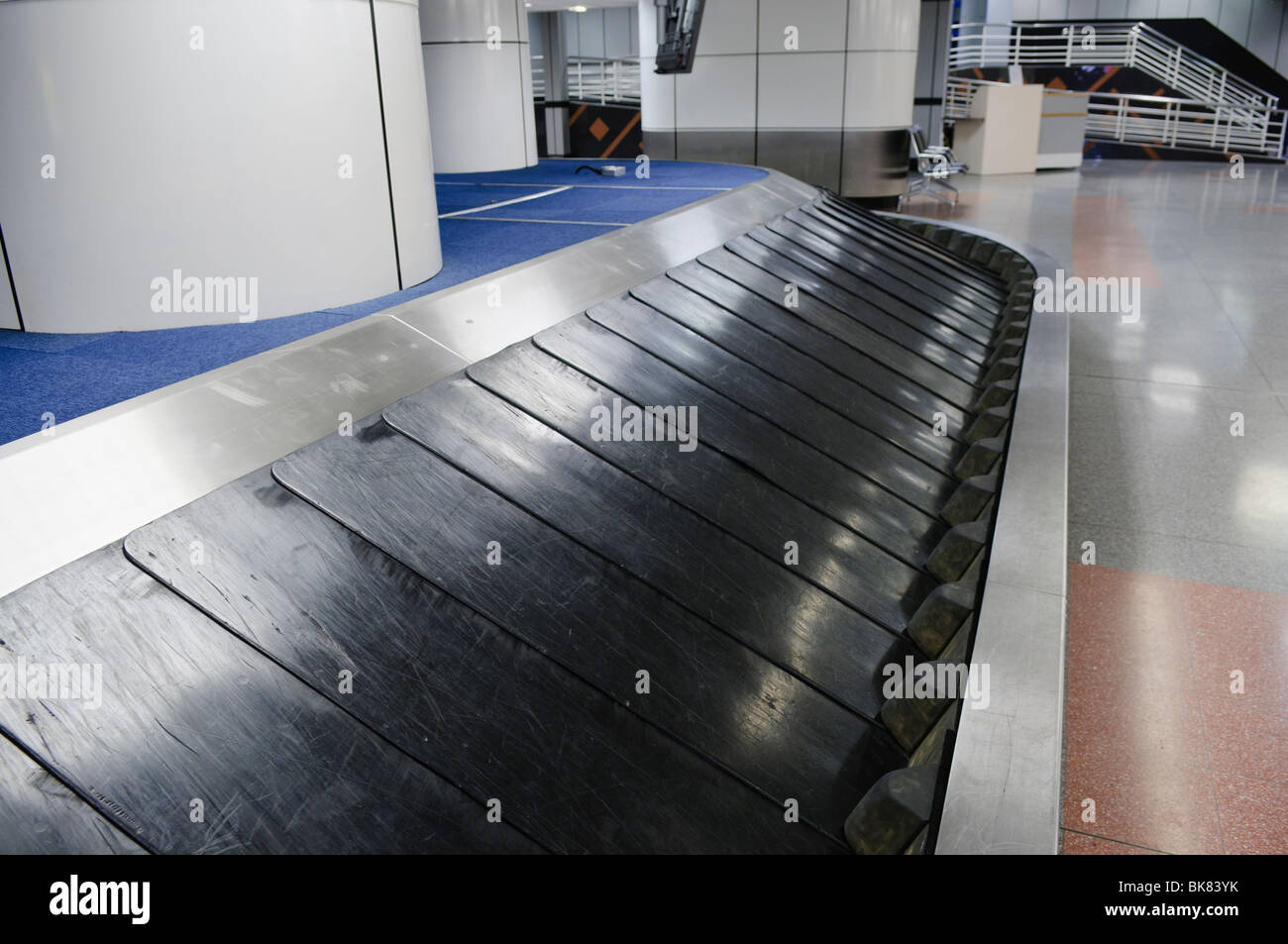Empty luggage/baggage carousel at an airport Stock Photo