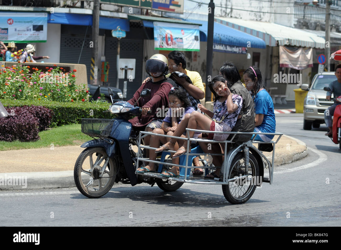 Group of people on a motor scooter in Thailand Stock Photo