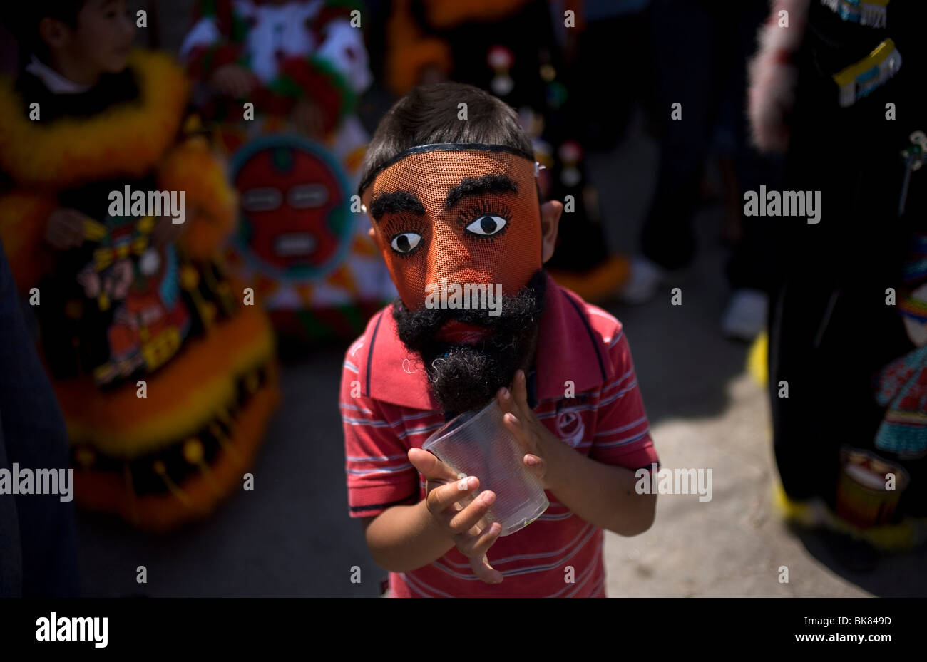 A boy wears a Chinelo mask during Carnival celebrations in Yautepec, Mexico Stock Photo