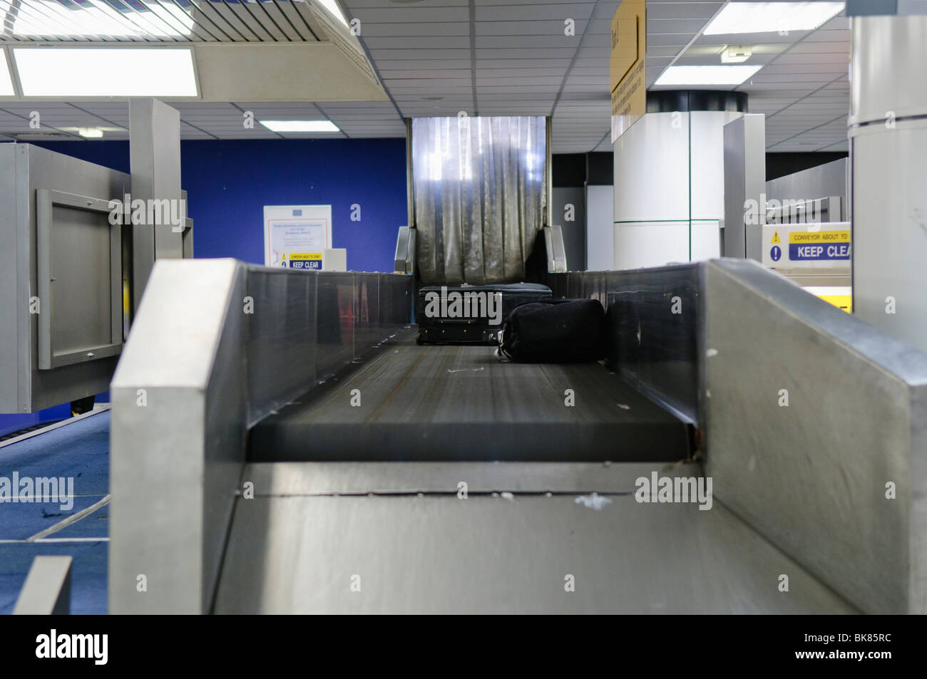 Baggage/Luggage on a luggage carousel at an airport Stock Photo