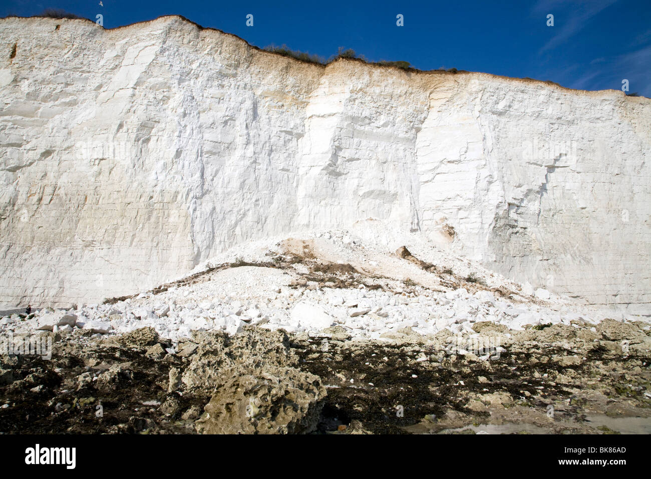 Cliff rock fall mound at the base of a chalk cliff Stock Photo Alamy