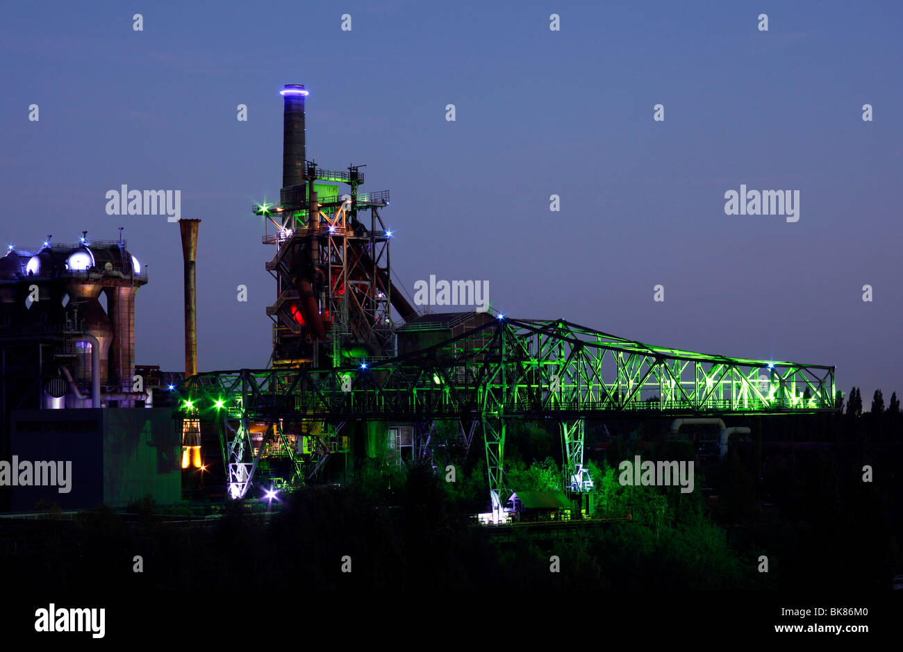 Illuminated industrial plant in the Landschaftspark Duisburg-Nord landscaped park, former steel mill Huettenwerk Meiderich, Dui Stock Photo