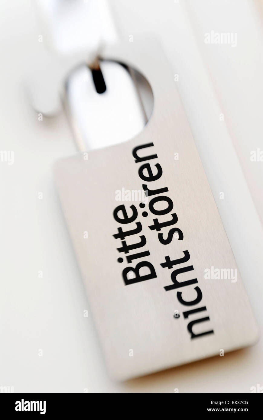 Door with a Do not disturb sign in German, Bitte nicht stoeren Stock Photo