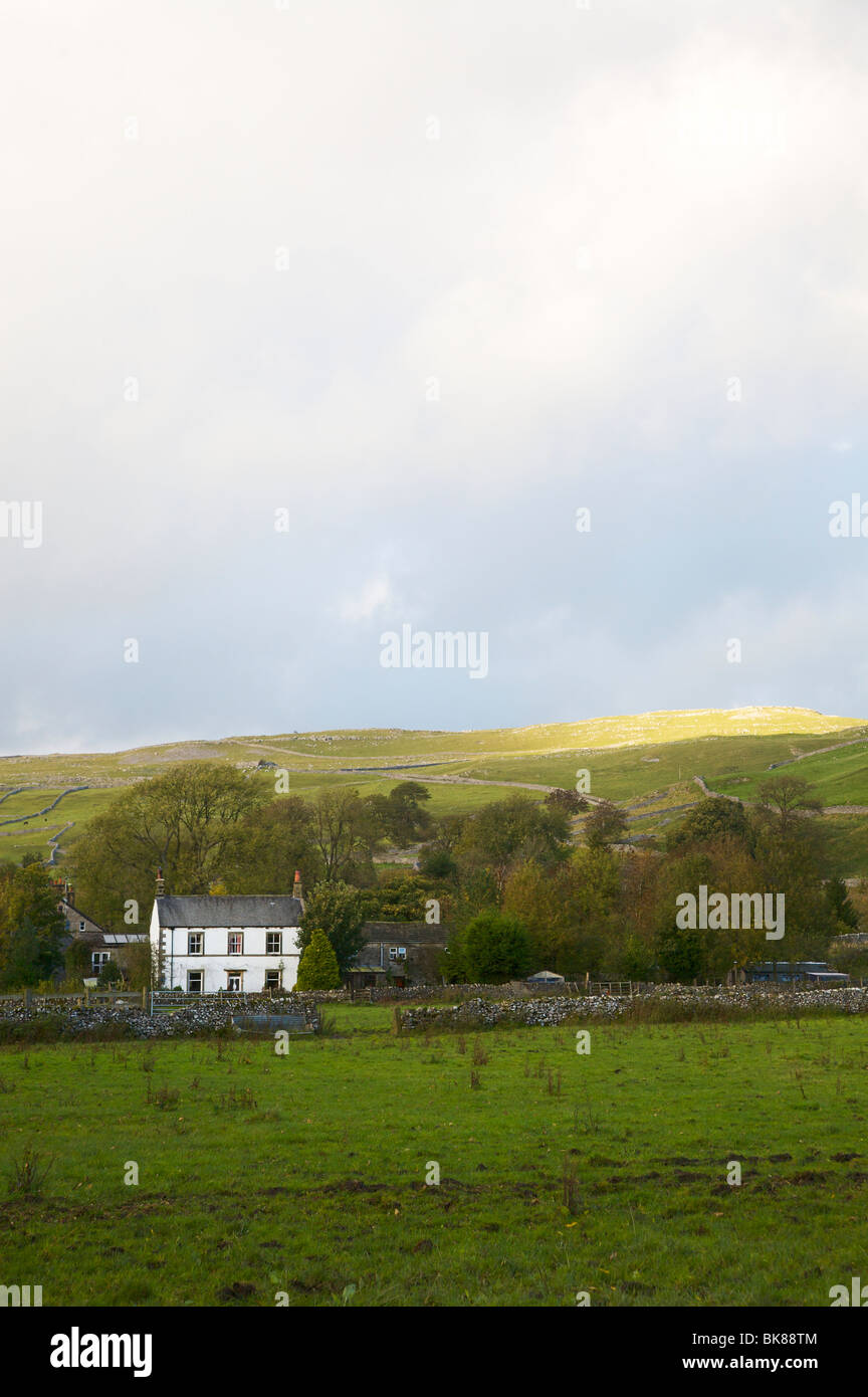 White house in fields near Yorkshire village of Malham Stock Photo Alamy