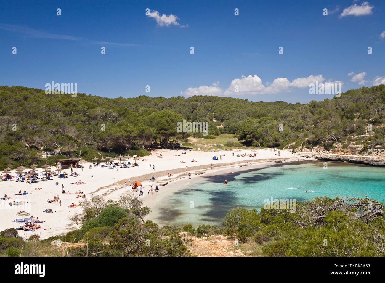 Beach life in the bay of s'Amarador, Cala Mondragó, natural park of Mondragó, Mallorca, Majorca, Balearic Islands, Mediterranea Stock Photo