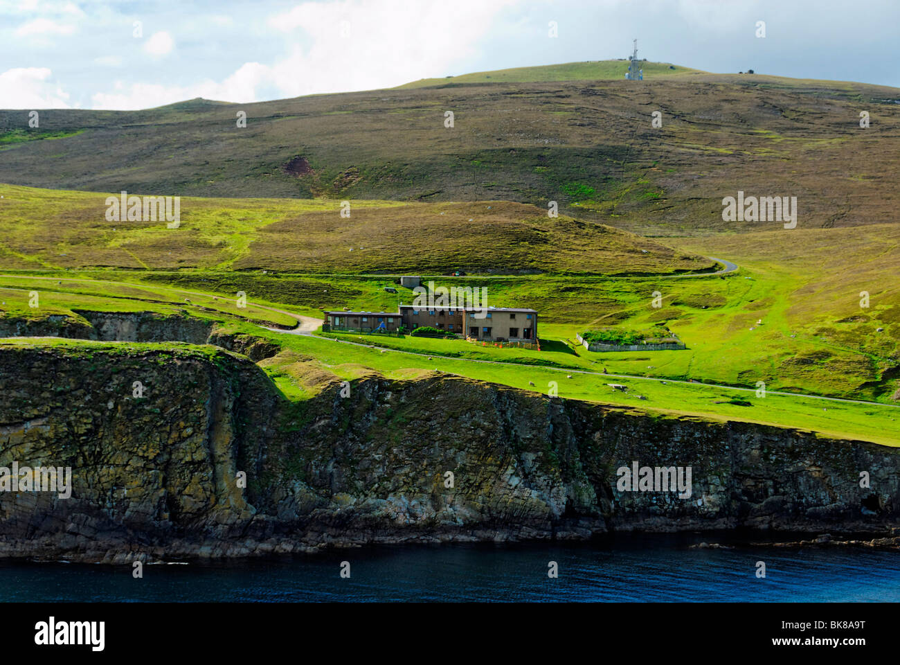 View of the southern harbour and the Fair Isle Bird Observatory, FIBO, Fair Isle, Shetland, Scotland, United Kingdom, Europe Stock Photo