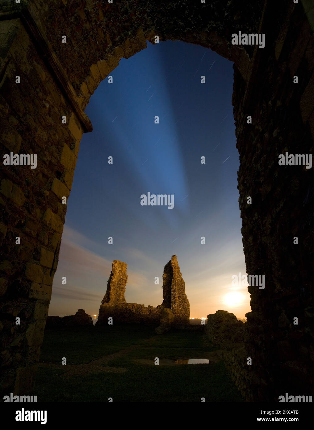 View from inside the Reculver towers with moonlight at night in Reculver, Kent, UK. Stock Photo