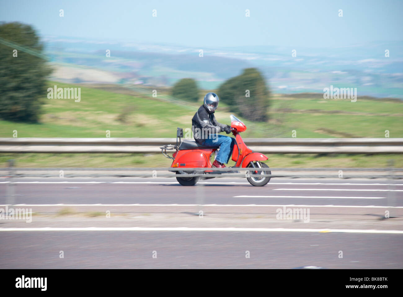 Scooter rider on the M62 motorway near Outlane Huddersfield