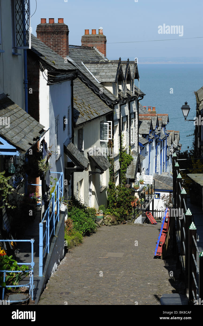 Very steep street in Clovelly village North Devon with the blue sea and