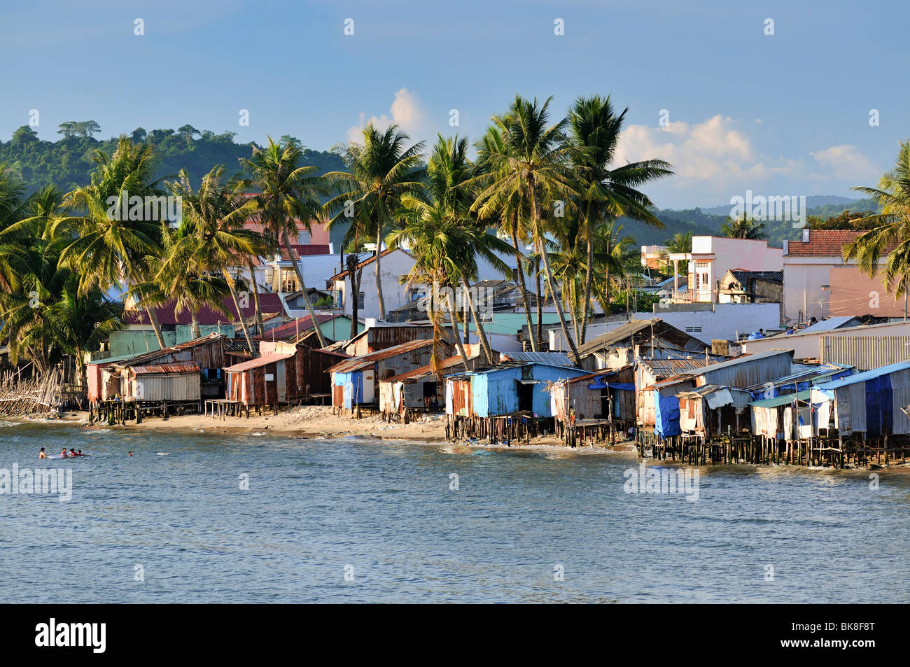 Idyllic fishing village with simple colorful wooden houses and palm trees, Phu Quoc, Vietnam, Asia Stock Photo