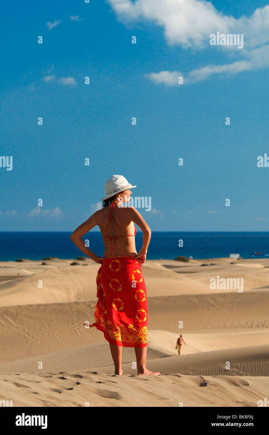 Woman in the sand dunes of Maspalomas, Gran Canaria, Canary Islands, Spain, Europe Stock Photo
