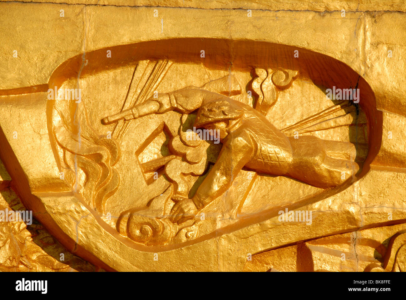 First Indochina War 1954, fighting Viet Minh soldier of the infantry, golden relief at the military cemetery, Dien Bien Phu, Vi Stock Photo