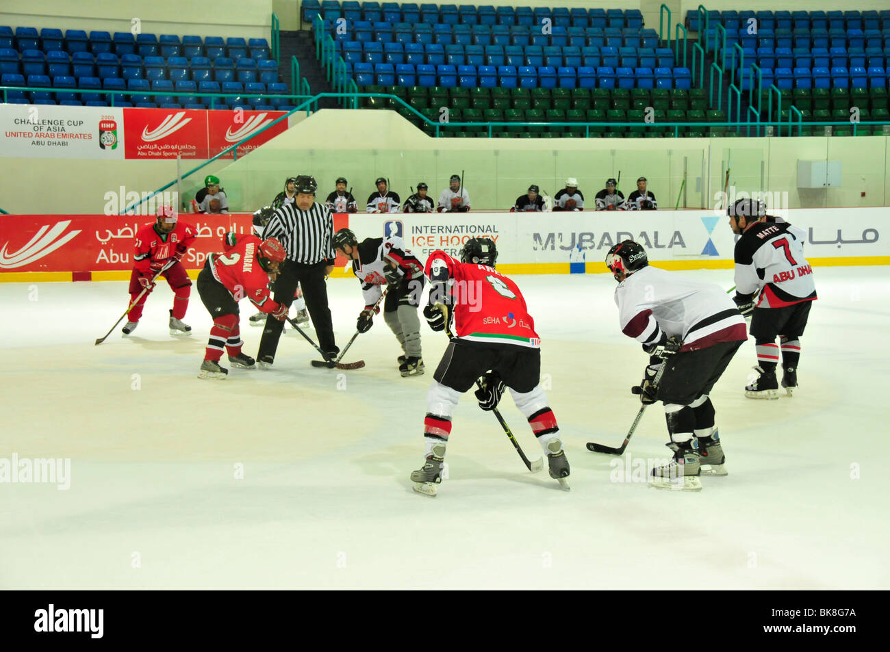 Hockey game of the Abu Dhabi Scorpions against the national team of the United Arab Emirates in the ice hockey stadium, ice rin Stock Photo