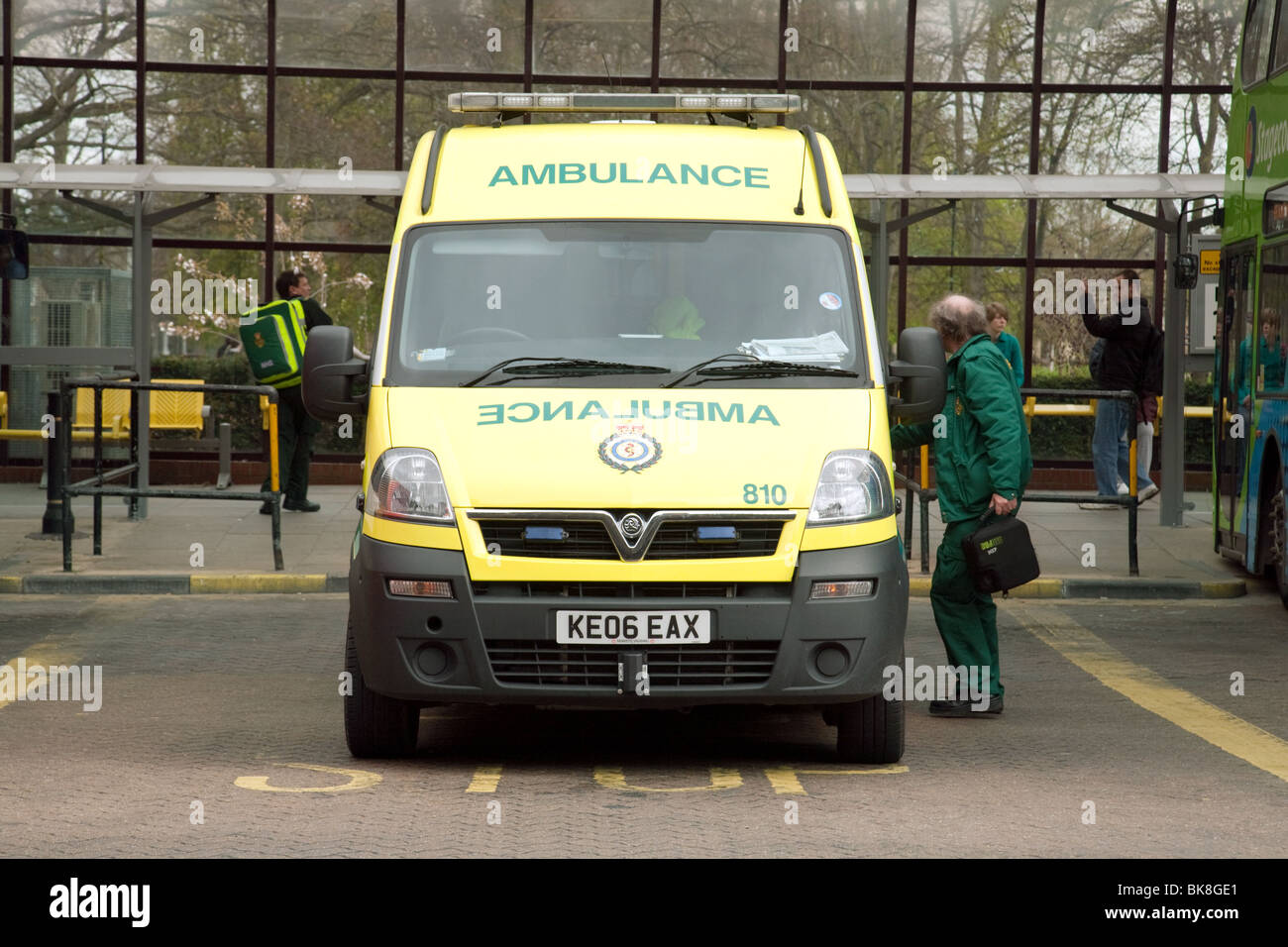 Paramedics and their ambulance attending an emergency call, Cambridge bus station, Cambridge UK Stock Photo