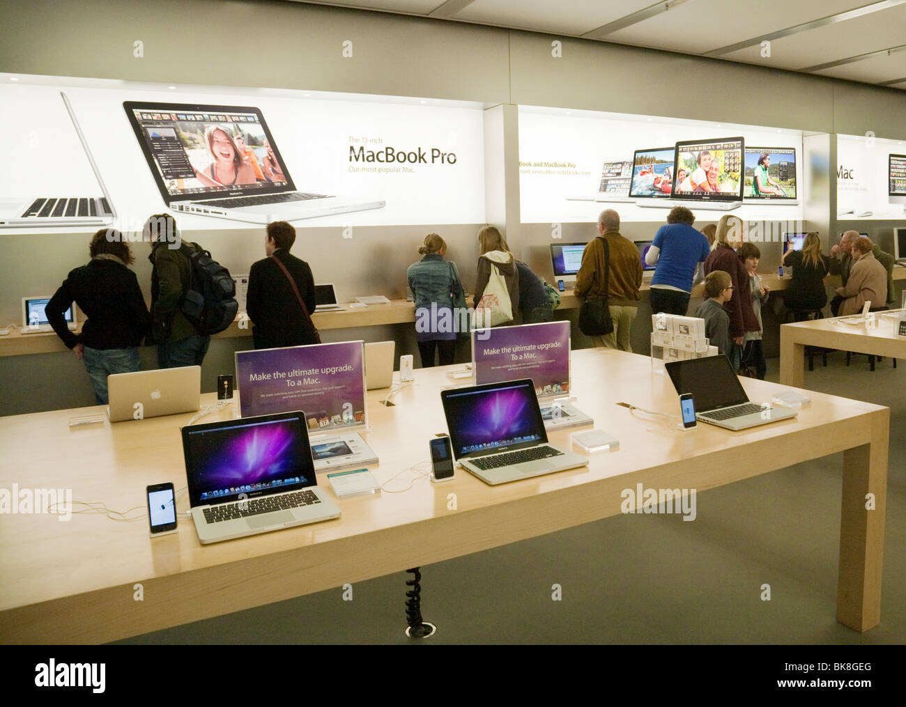 People in an Apple Store, The Grand Arcade, Cambridge UK Stock Photo