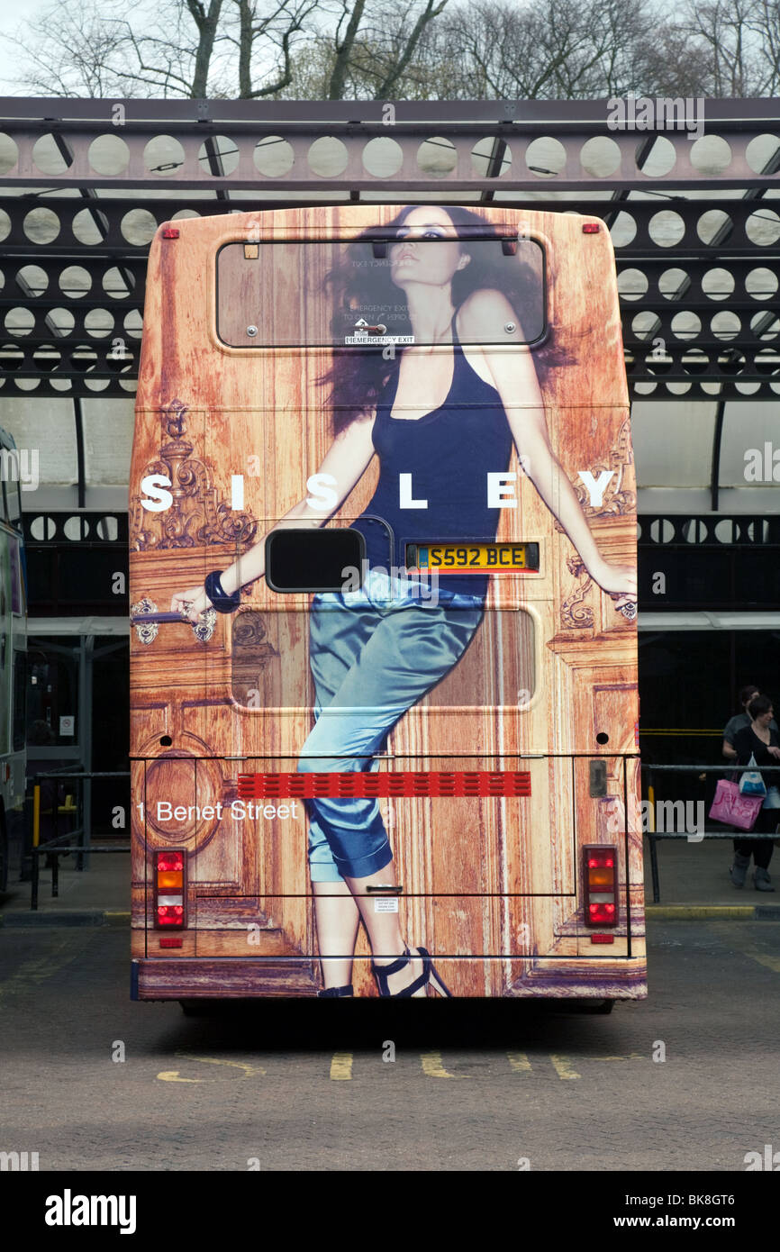 Sisley Clothes store being advertised on the back of a double-decker bus, The bus station, Cambridge, UK Stock Photo