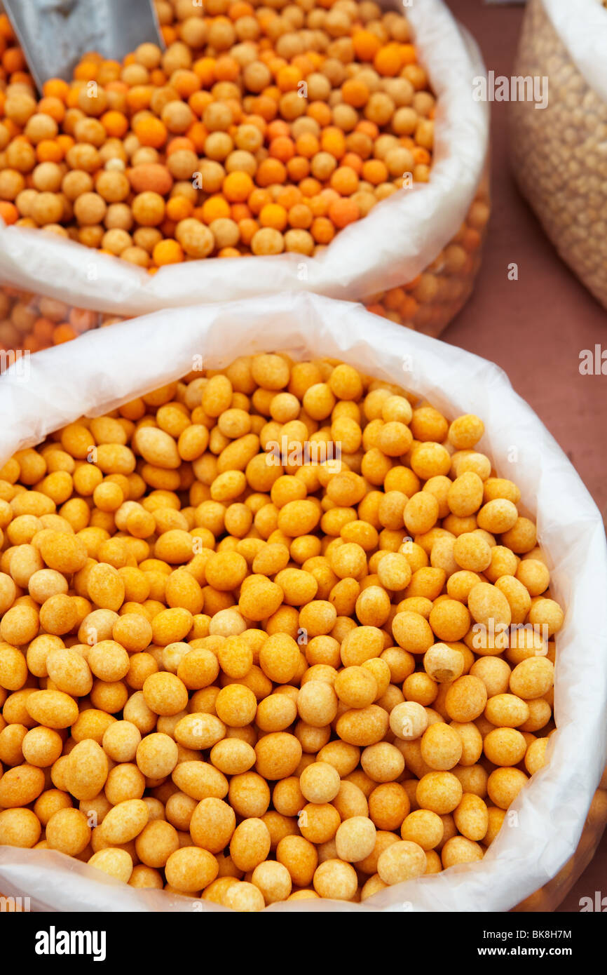 Bags of dry Soya beans from the market as a textured food background