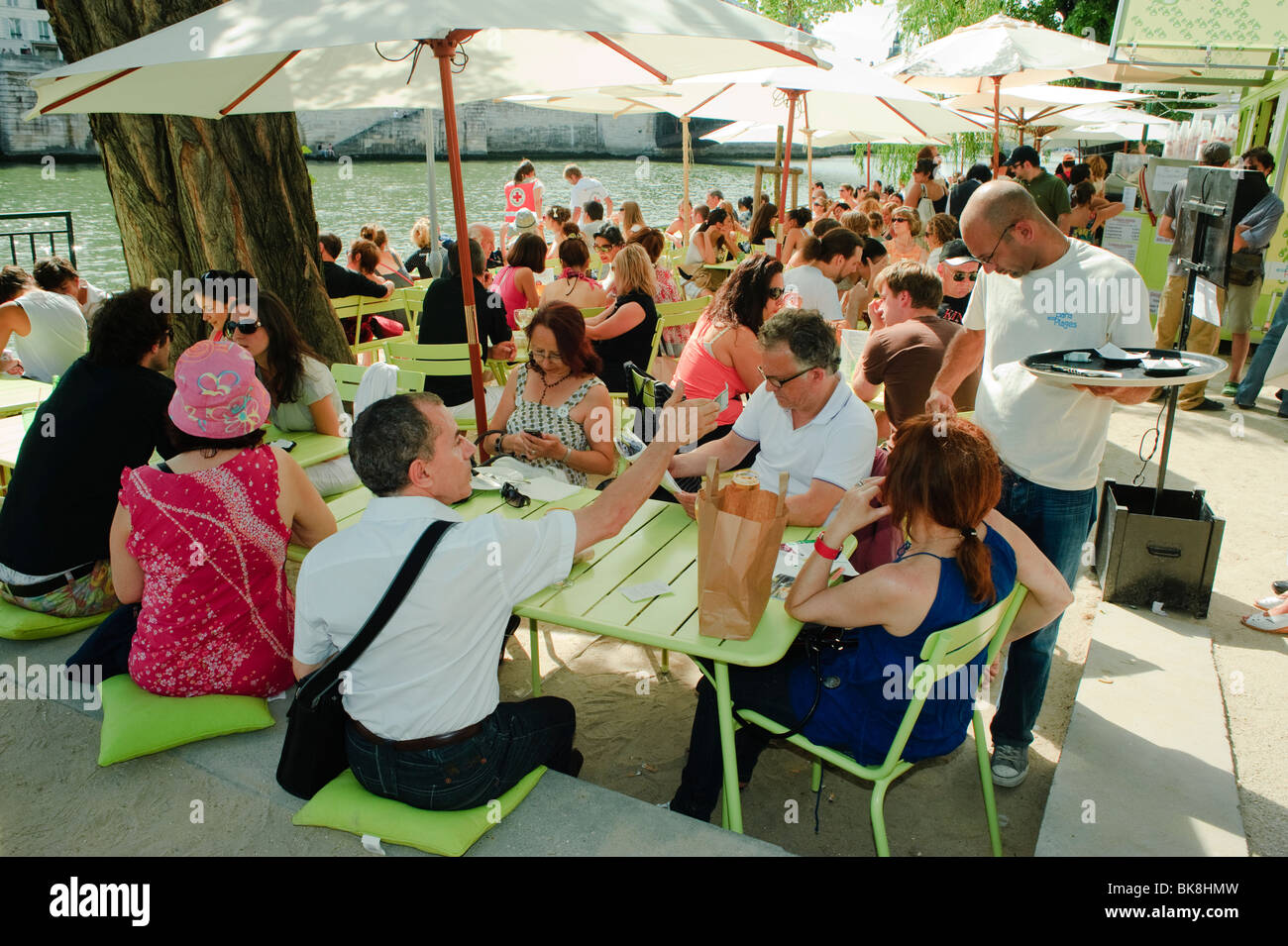 Crowd Of People Enjoying Paris Plages Urban Beach On River
