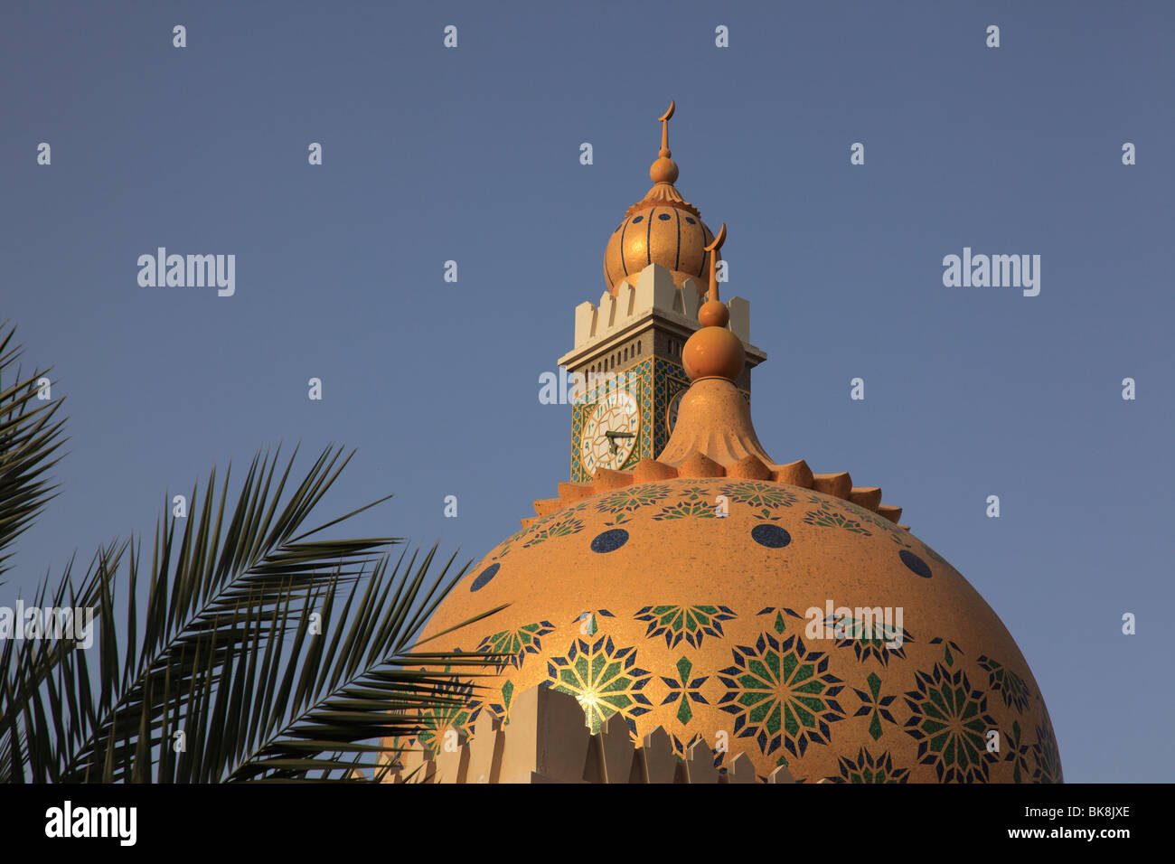 Muttrah Mosque Minaret clock tower and dome of Zawawi mosque in Muttrah, Sultanate of ...