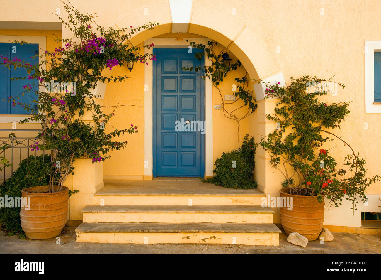 Attractive arched entrance to house. Assos, Kefalonia, Greece Stock Photo