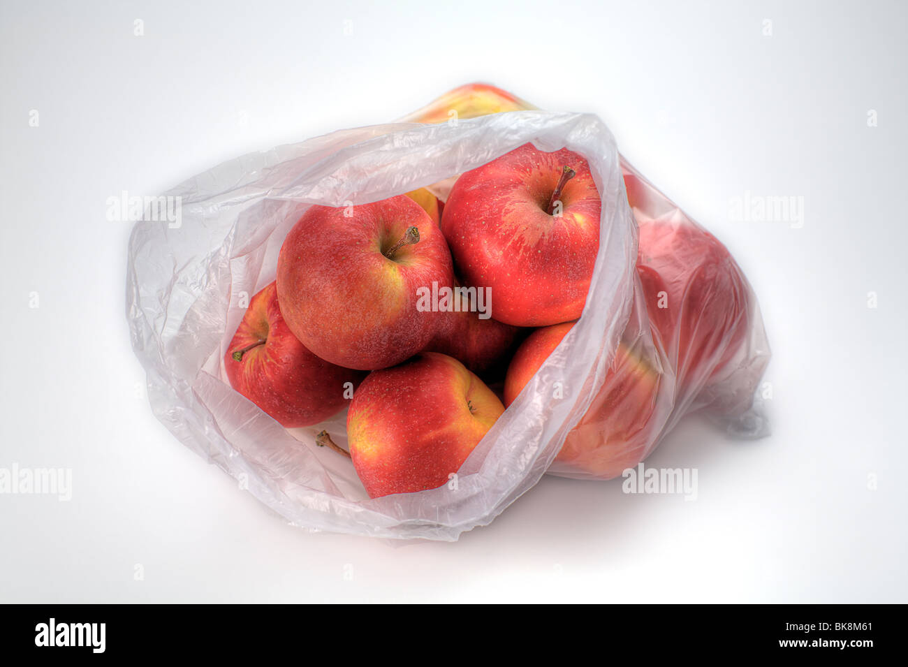 https://c8.alamy.com/comp/BK8M61/a-plastic-bag-of-gala-apples-isolated-on-white-BK8M61.jpg