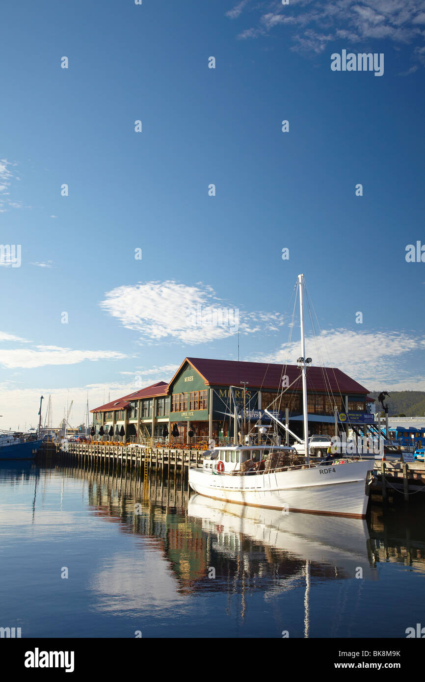 Fishing boats and mures seafood restaurant hires stock photography and