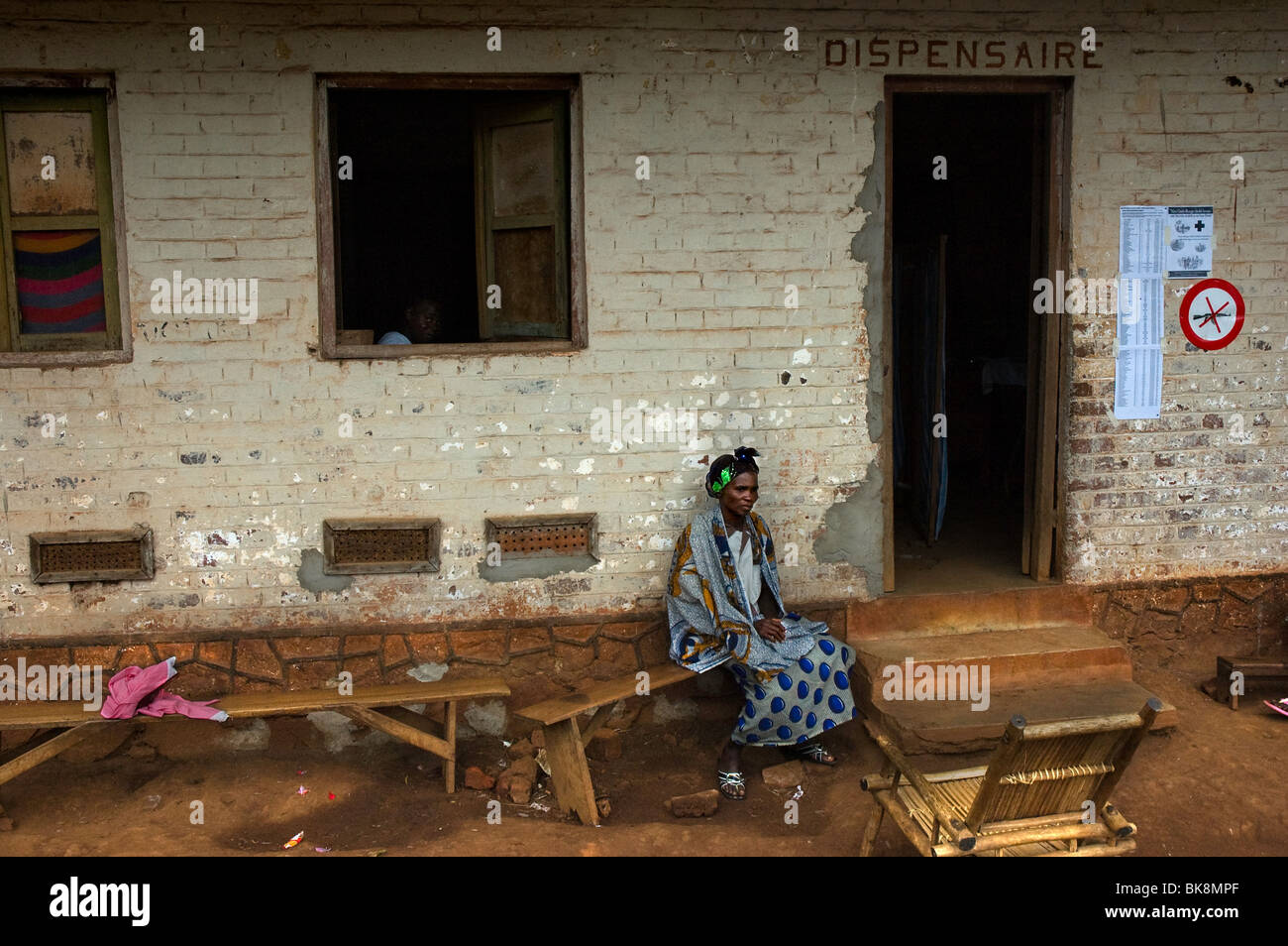 Last patient waiting for consultation in an african dispensary, health clinic, Stock Photo
