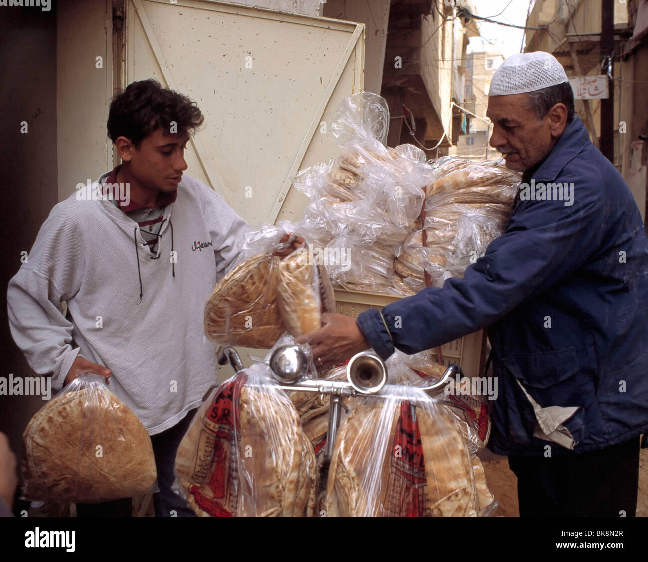 Distribution of Bread Palestinian camp Beirut Lebanon Stock Photo