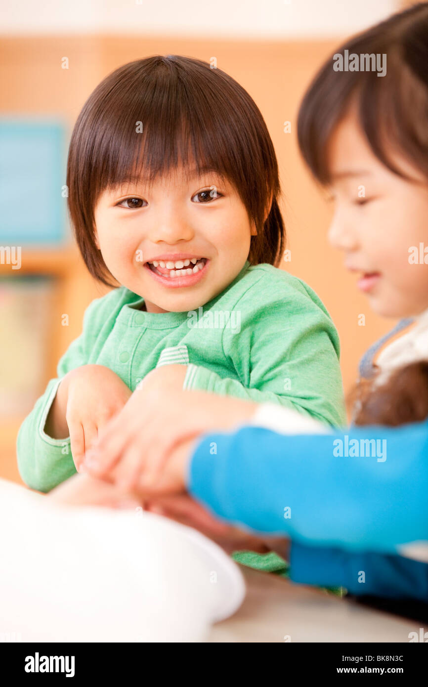 Children playing day care center hi-res stock photography and images ...