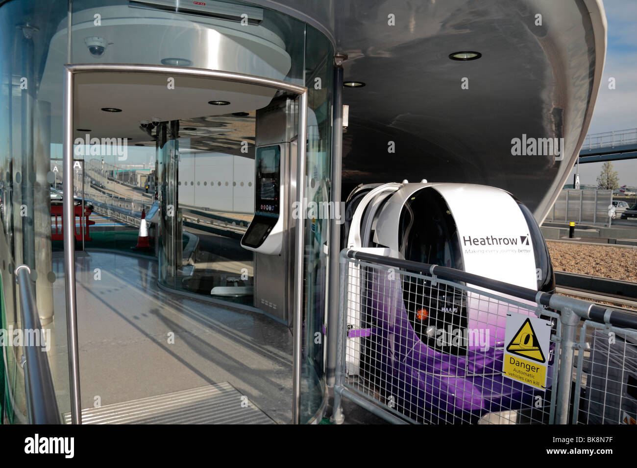 A Personal Rapid Transport (PRT) pod waiting at a car park station at