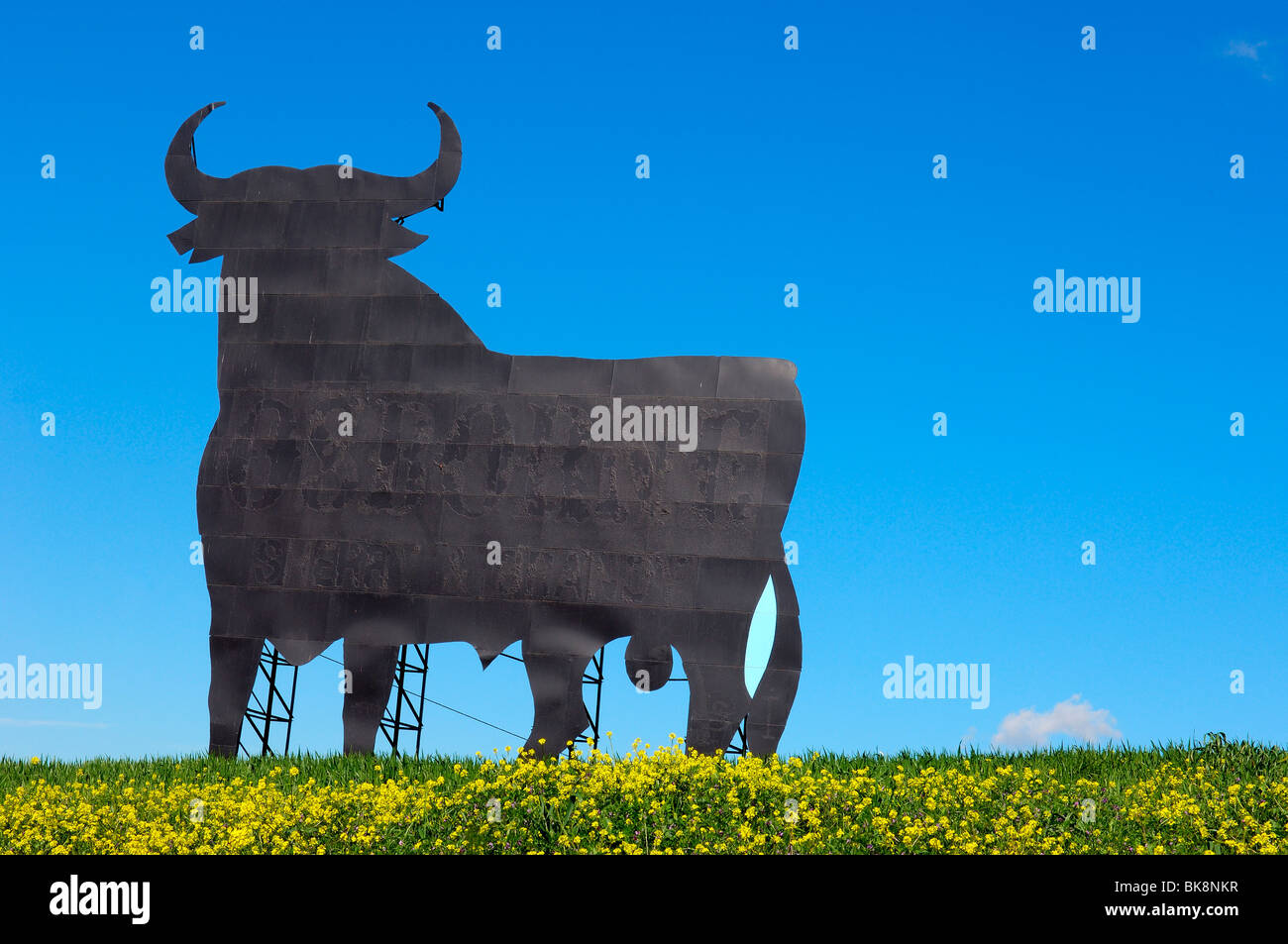 Bull silhouette, typical advertising of Spanish sherry Osborne. Malaga. Andalusia, Spain Stock Photo