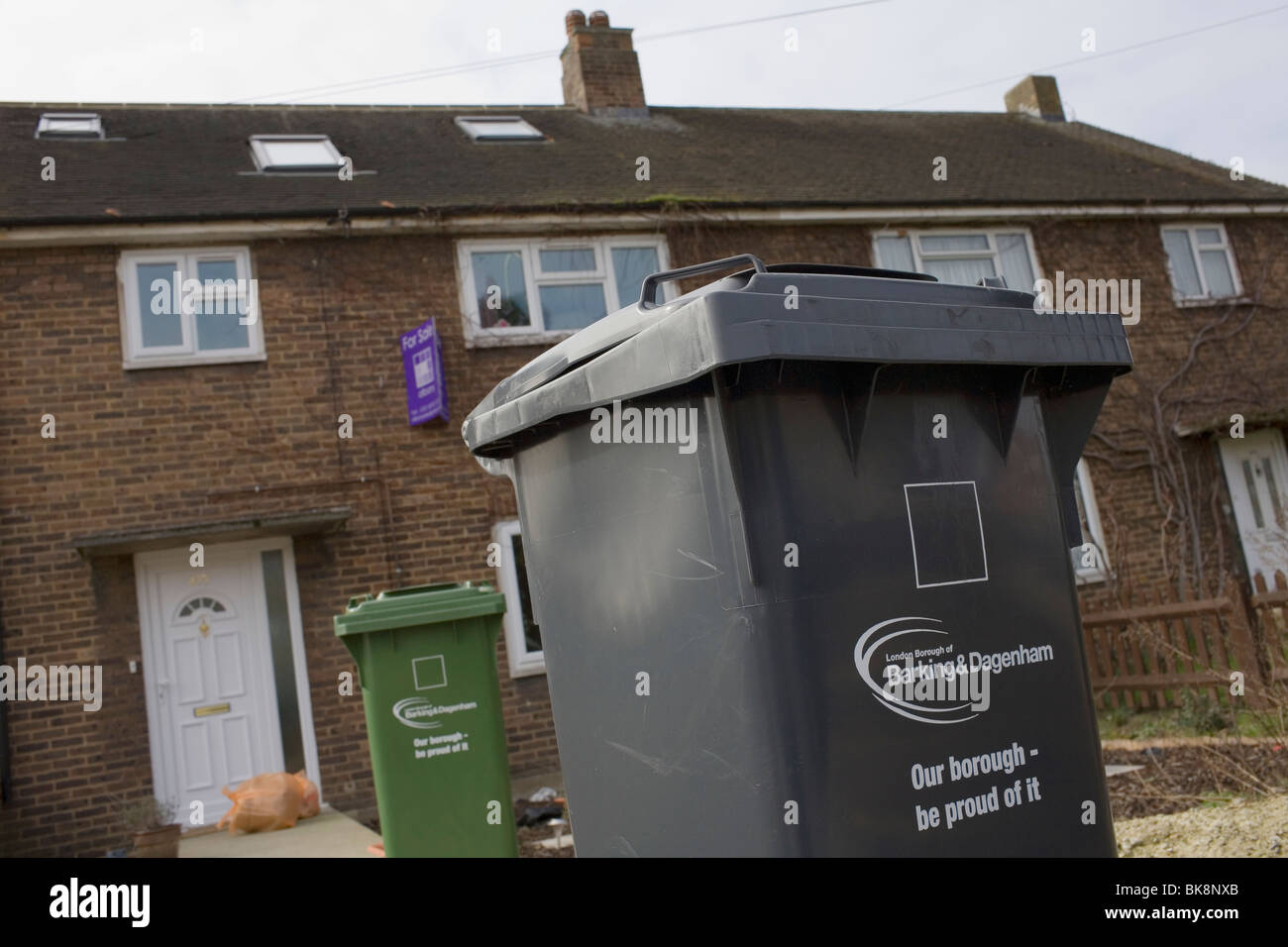 'Our borough be proud of it' the message on trash bins outside a