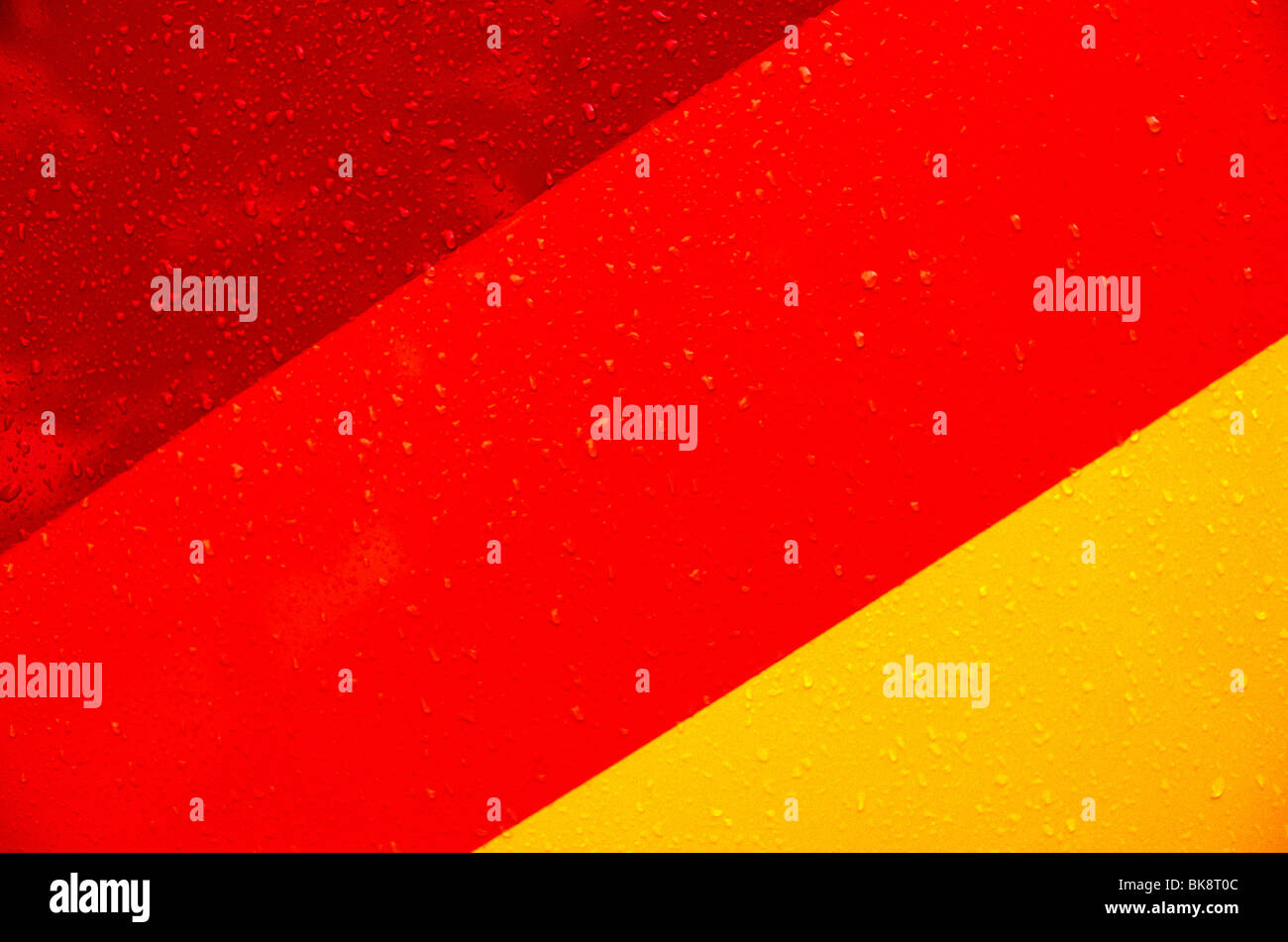 Detail of colorful painted stripes and raindrops on a ferry boat, Tyrol Region, Austria Stock Photo
