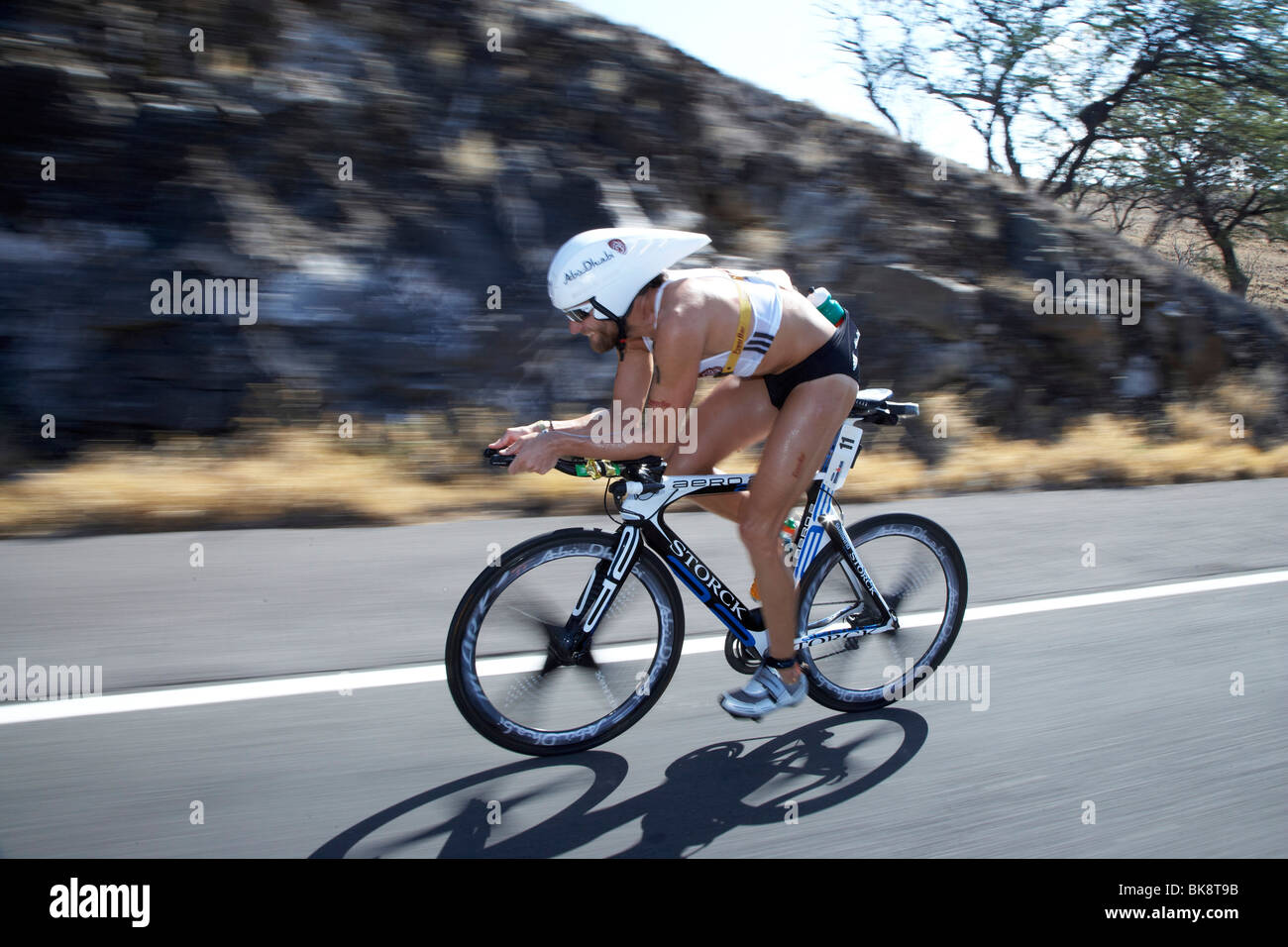 The German professional triathlete Faris Al-Sultan on the bike course of Ironman Triathlon World Championship in Kailua-Kona, H Stock Photo