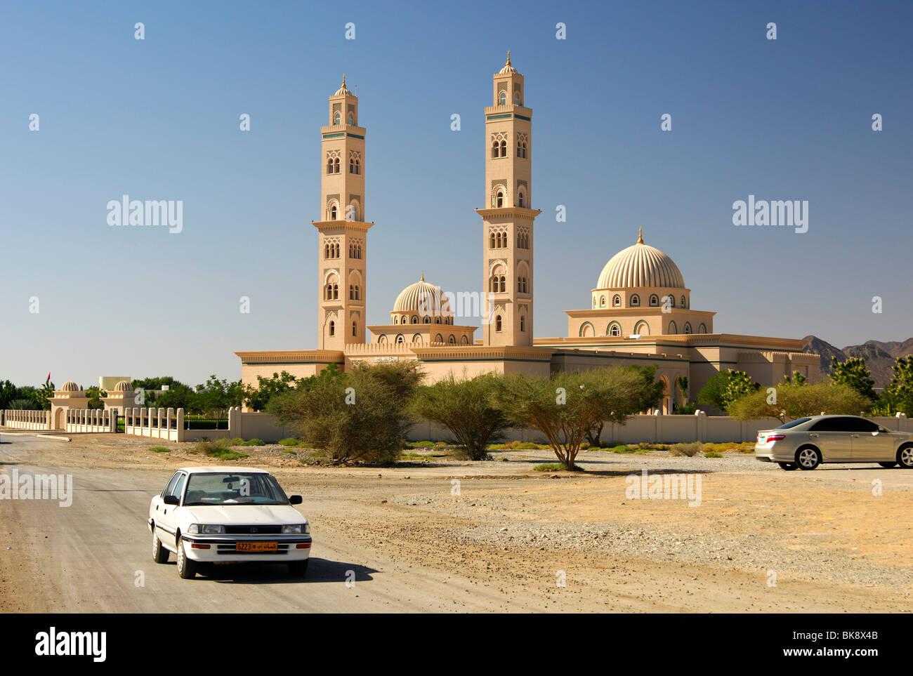 Mosque with two slender minarets and two domes, Bahla, Sultanate of Oman, Middle East Stock Photo
