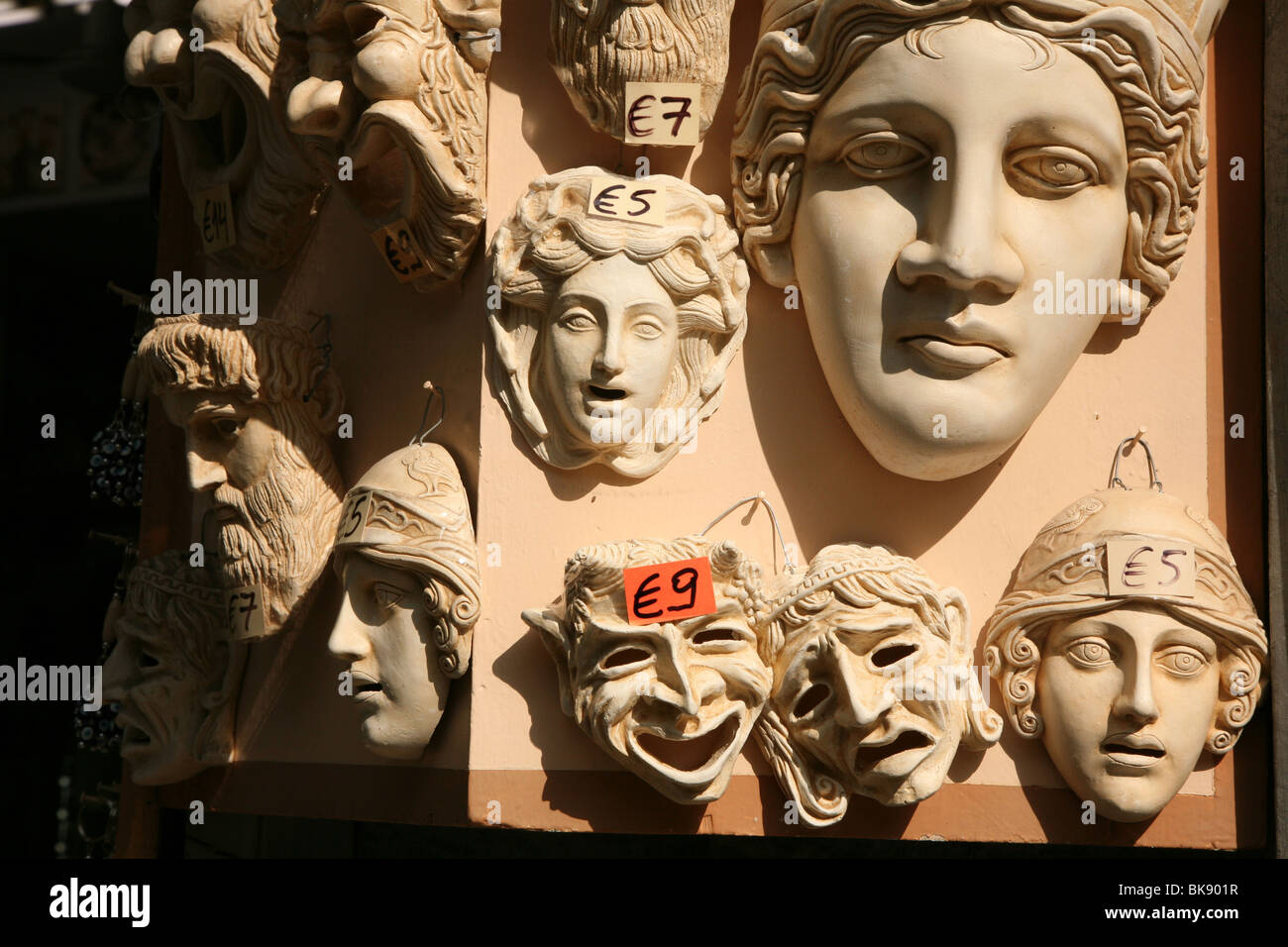 Plaster mask in a souvenir shop in Plaka quarter in Athens, Greece. Stock Photo
