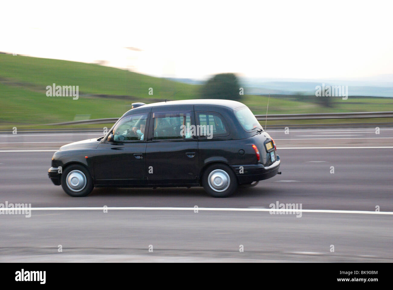 Taxi on the M62 motorway Stock Photo