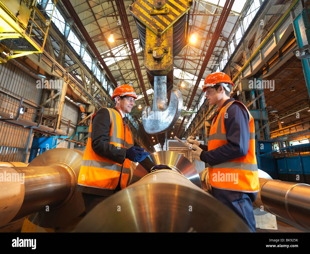 Engineer & Apprentice With Steel Rollers Stock Photo Alamy