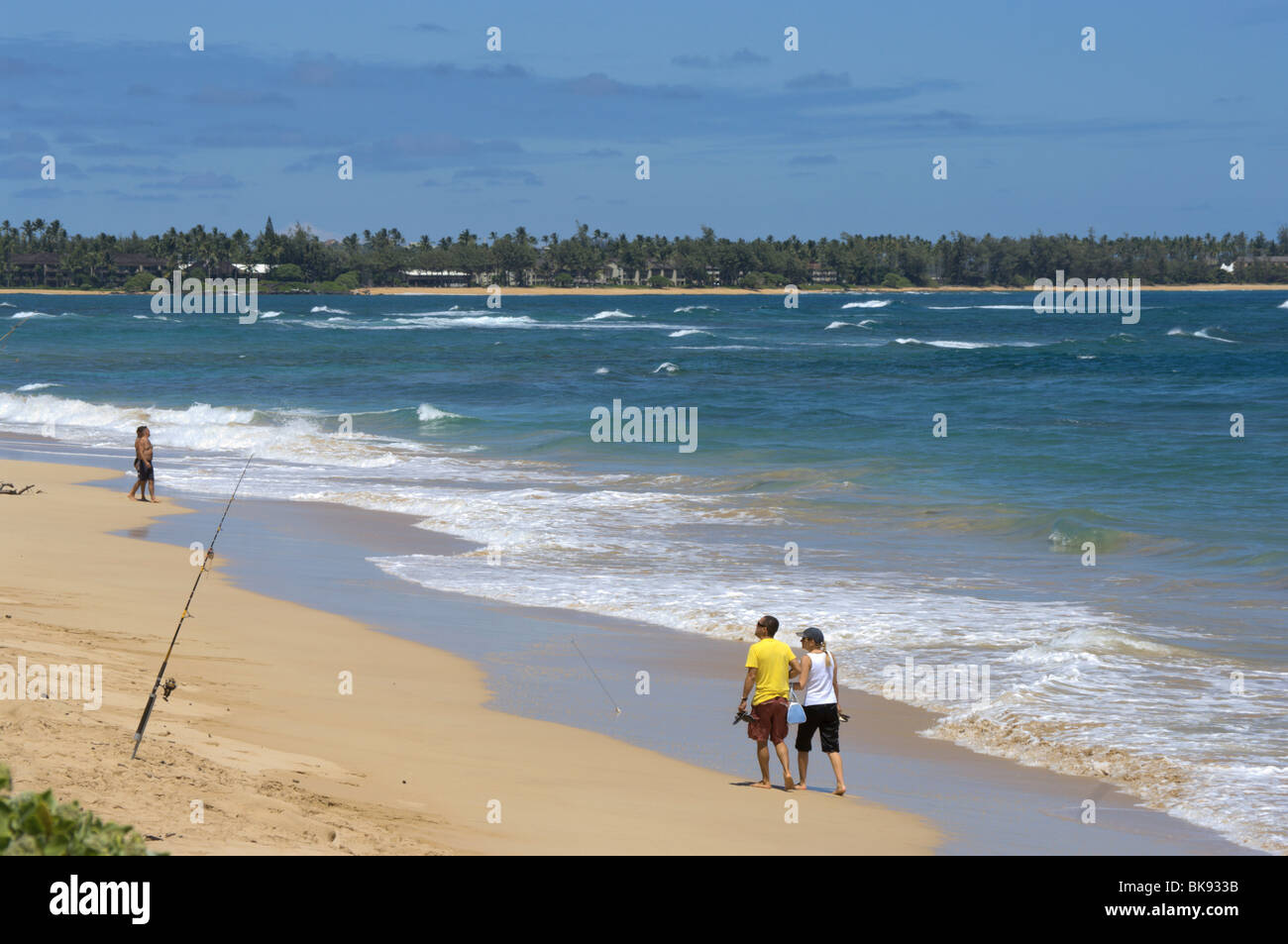 Woman walking on tropical beach hi-res stock photography and images - Alamy