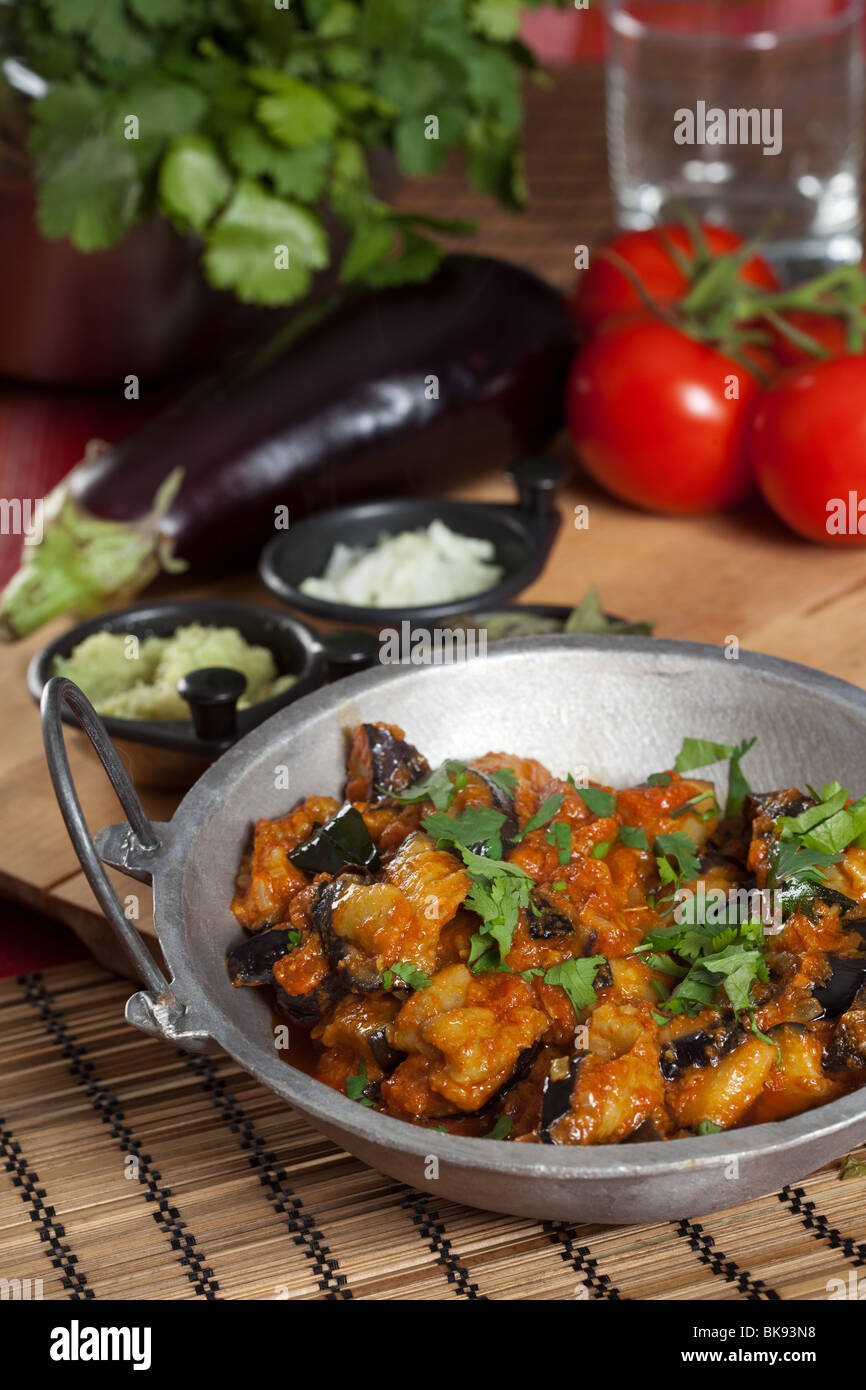 Indian dish with fried aubergine Stock Photo Alamy