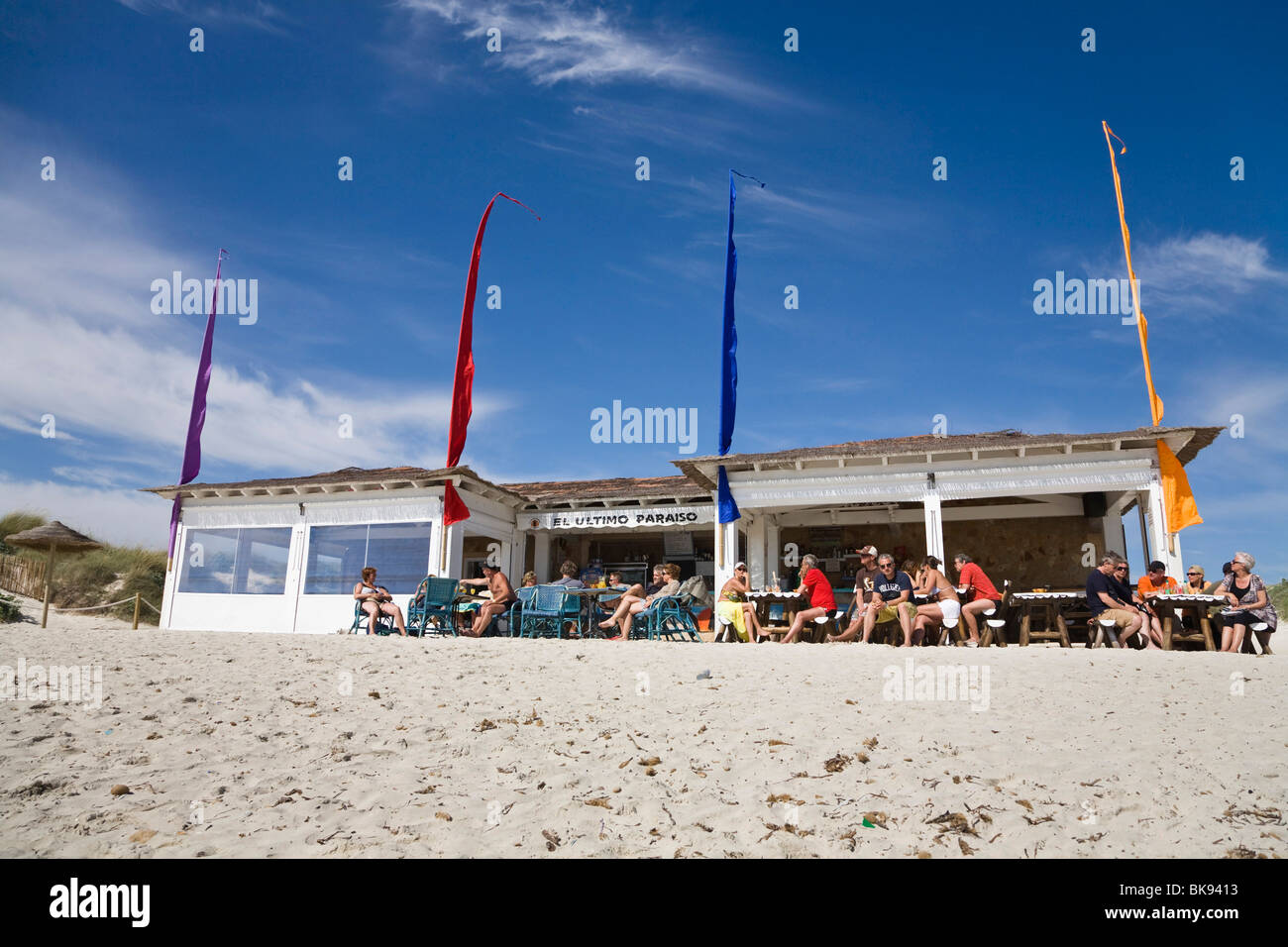 People siting in front of a beach bar at the beach of Es Trenc, Mallorca, Majorca, Balearic Islands, Spain, Europe Stock Photo