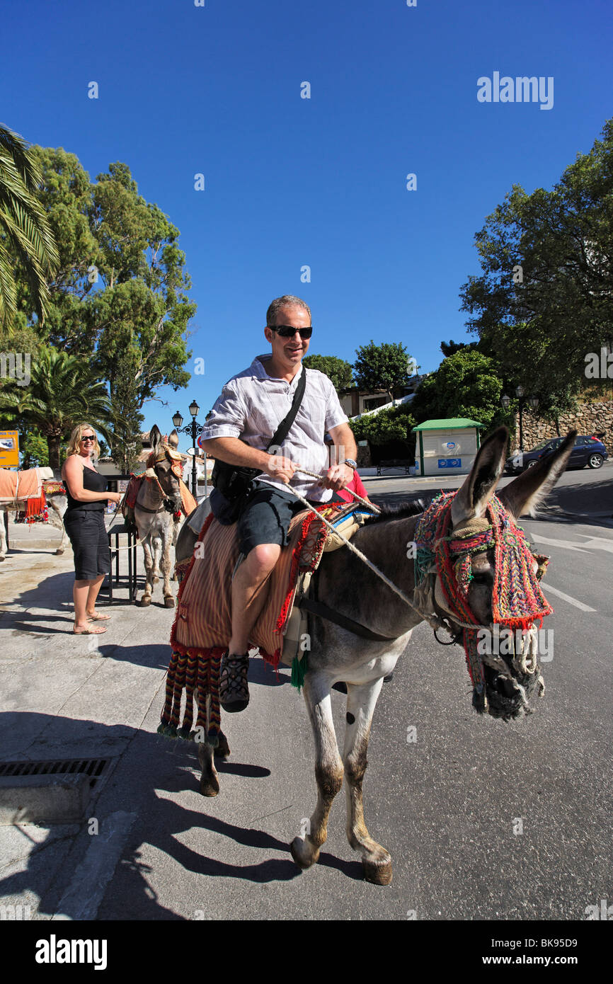 Tourist riding a donkey, Mijas, Andalusia, Spain Stock Photo Alamy