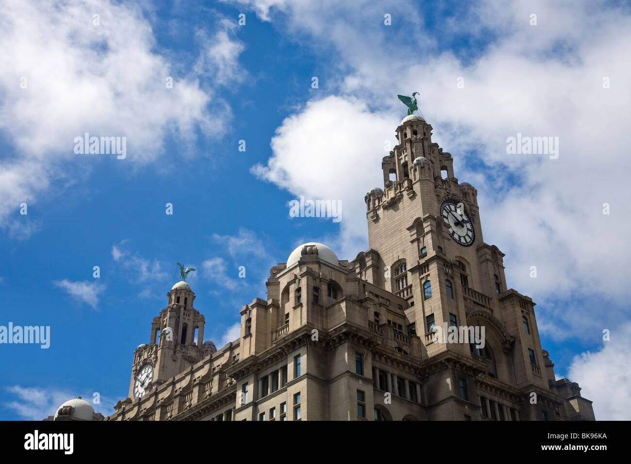 Low angle view of the clock tower of a building, Royal Liver Building, Liverpool, Merseyside, England Stock Photo
